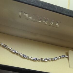 Peoples 10K White Gold Tennis Bracelet Purple Tanzanite